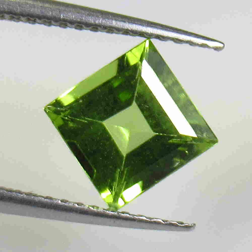 1.70 Ctw Natural Pakistan Peridot Square Cut: No Reserve! Title: 1.70 Ctw Natural Pakistan Peridot Square Cut Stone Clarity: VVS Gemstone: Peridot Carat Weight: 1.70 Size/Dimensions: 7.00 x 7.00 x 4.10 mm Additional Information: Top Class Luster 