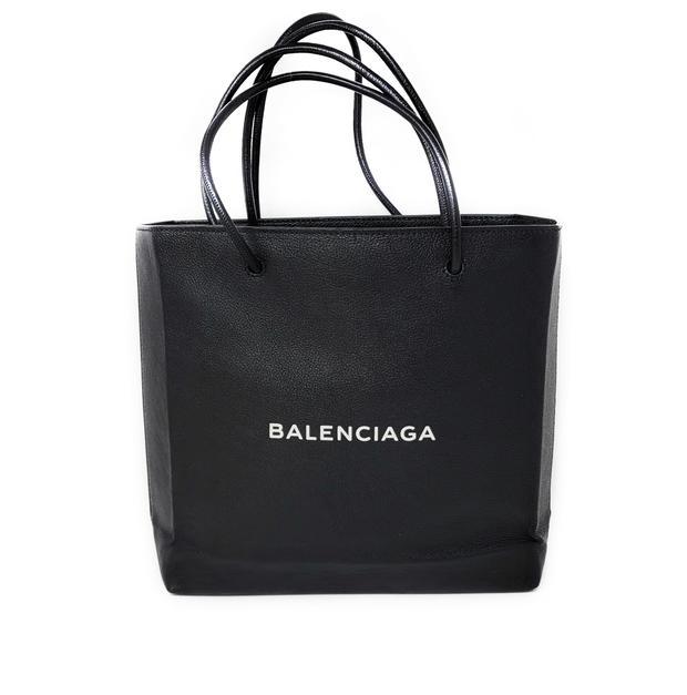 Balenciaga Black North South Shoulder Bag: Balenciaga North South Black Leather Tote Shoulder Bag with adjustable straps. Great Balenciaga bag with straps that can be adjusted in length as a shoulder bag or doubled, zipper closure and interior
