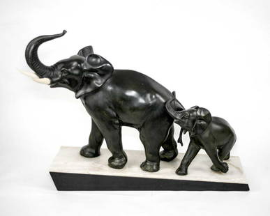 LARGE FRENCH ART DECO ELEPHANTS SCULPTURE IRENEE: Made in France in the 1930's this sculpture reflect the democratic desire of that time to produced affordable art . It is metal instead of bronze but the quality of design is here .It was done with