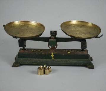 Antique French 10 Kilo Scale first quarter of XX: French scales of this type were used in stores for weighing produce. They consisted of a cast iron base with the weight mechanism at the top center. The arrow would have to be in the middle for the