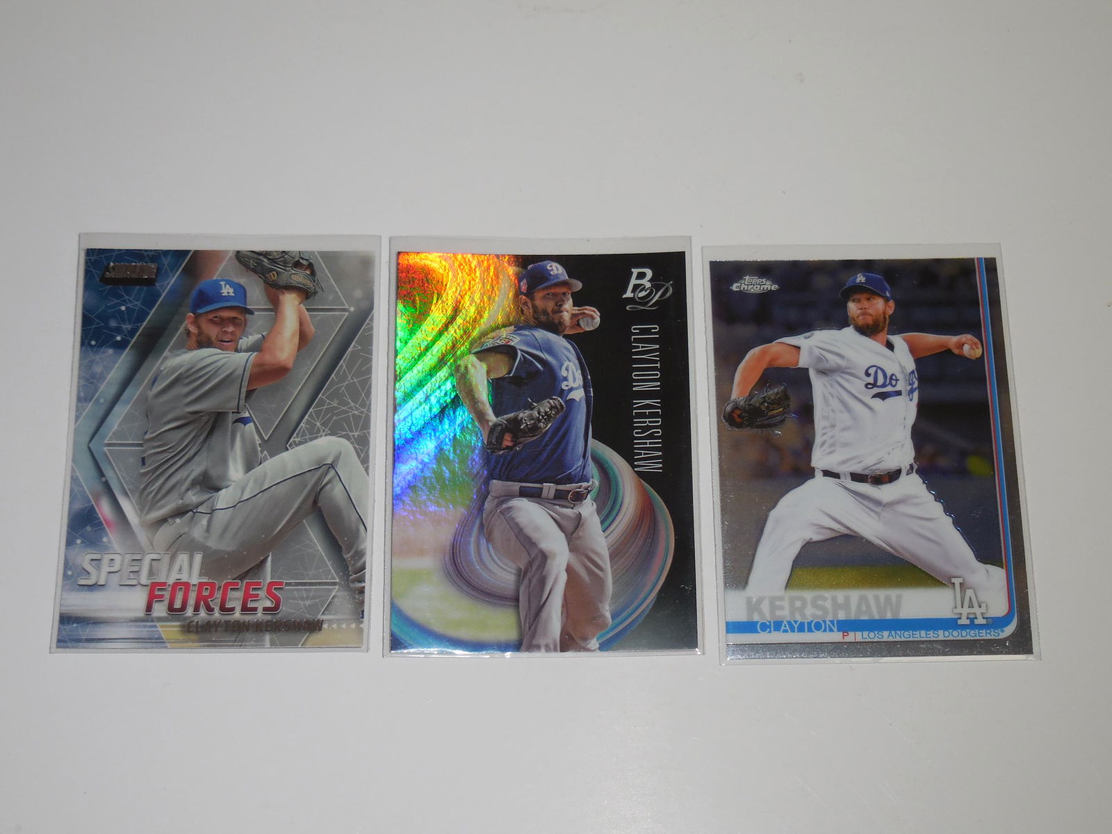 CLAYTON KERSHAW DODGERS LOT: Title: CLAYTON KERSHAW DODGERS LOTVARIOUS POKEMON HOLOFOIL LOT WITH MARILL, MEOWTH, VENIPEDE, METAPOD, CHIMCHAR, AND LITWICKMODERN Reserve: $3.00 Shipping: Domestic: Flat-rate of $5.00 to anywhere wit