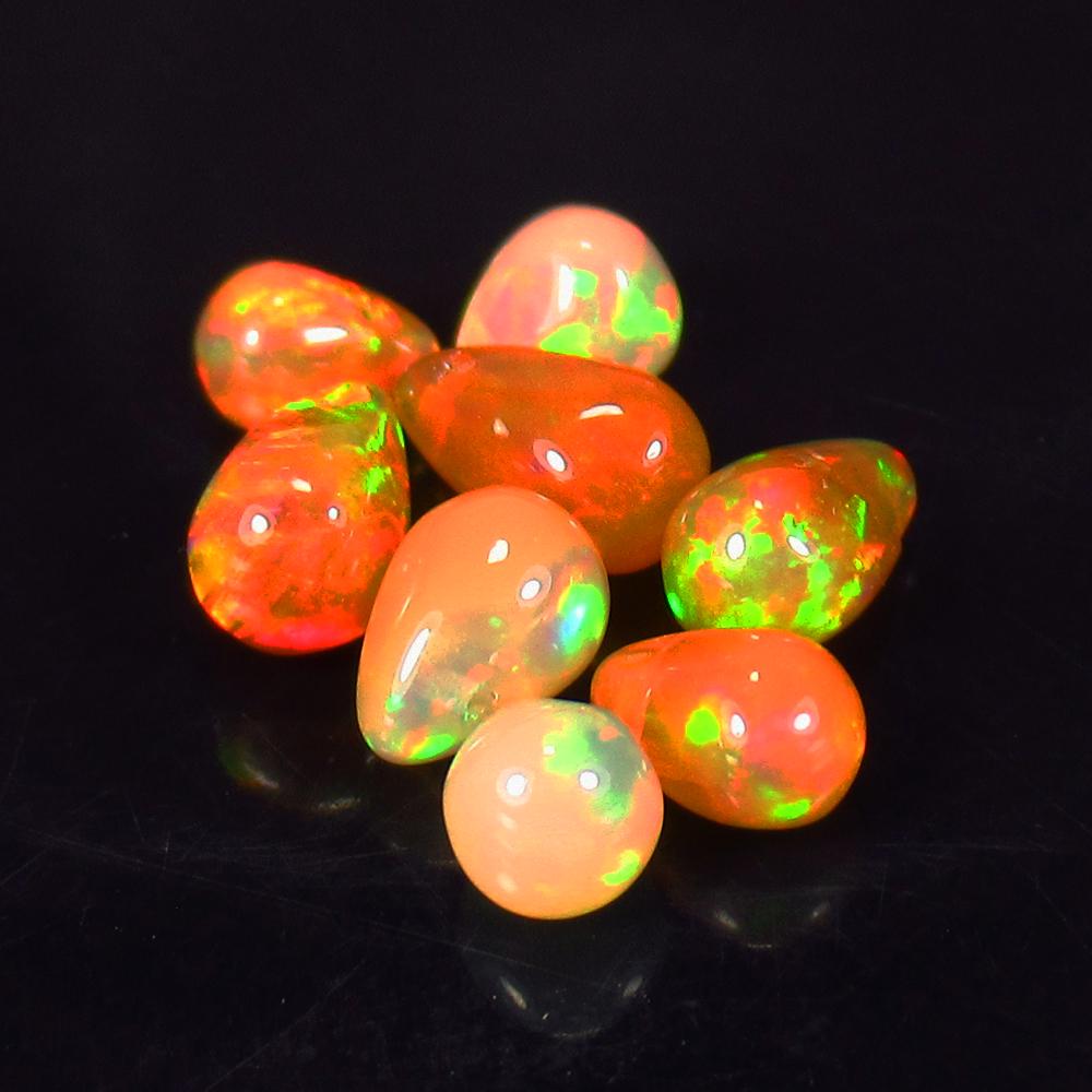 3.04 Ct Natural 8 Drilled Multi-Color Fire Opal Pear (1 of 2)