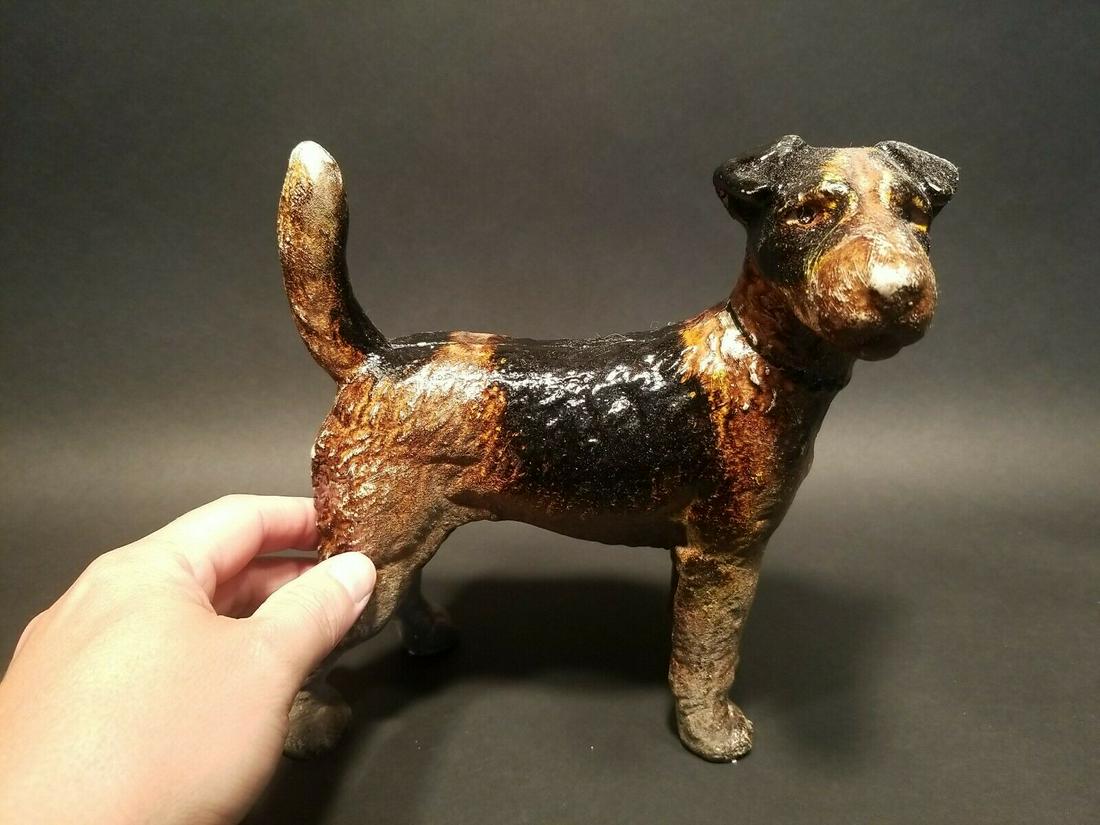 Cast Iron Terrier Dog: 8" Long x 8 1/4" Tall Great little reproduction cast iron terrier dog. All cast iron hand painted, slightly distressed as shown in the images. Certainly looks old! See our other miniature cast iron an