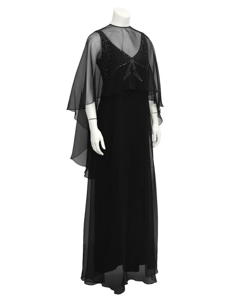 Leo Narducci Leo Narducci Black Chiffon Gown with Shawl: Elegant 1960's black chiffon gown with rhinestone studded bodice and matching removable diaphonous caplet. Perfect for an evening that requires a touch more "cover-up". In excellent condition. Dress: