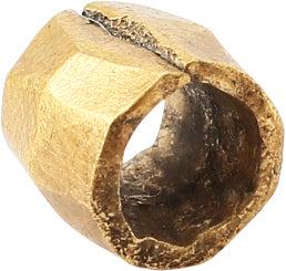 VIKING GILT BEAD, 9TH-11TH CENTURY AD: 6.2mm length, just under 1/4". Hand formed from bronze, forged to hexagonal section with the center swelled to a ridge. Butted seam. Professionally refurbished with the 24karat gold overlay restored. 