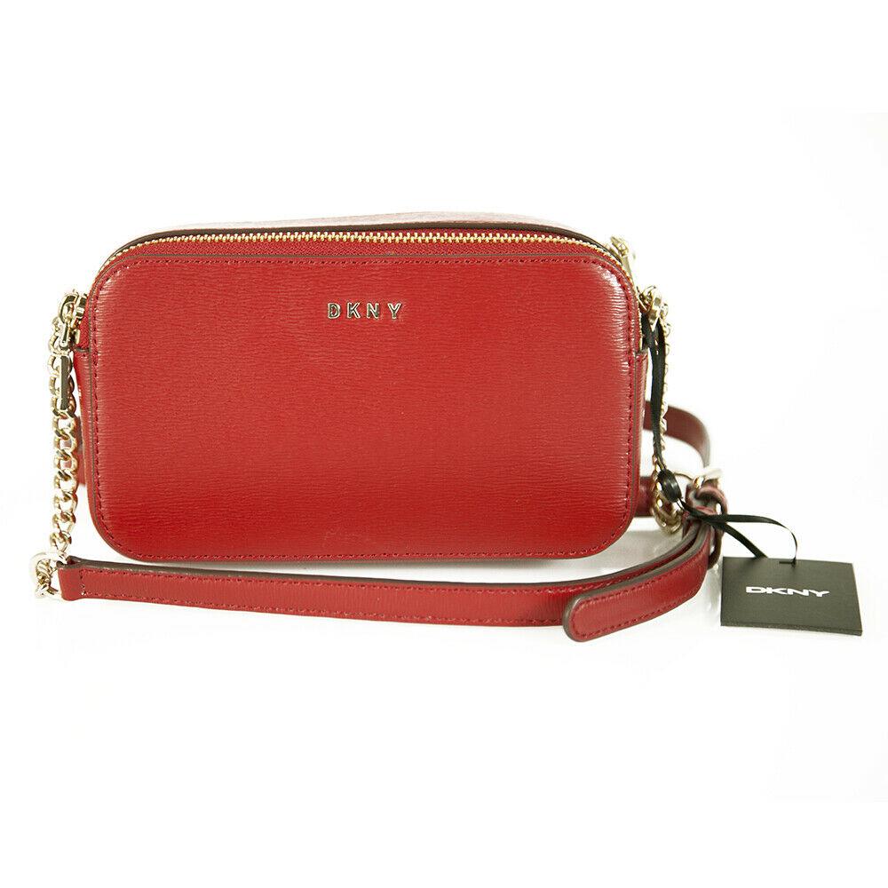 DKNY Donna Karan Camera Red Leather Messenger Shoulder: DKNY Donna Karan Camera Red Leather Messenger Shoulder Bag Crossbody When you're traveling light, there's no better way to do it than with the DKNY Crossbody. A magnificent piece, light and easy to ca