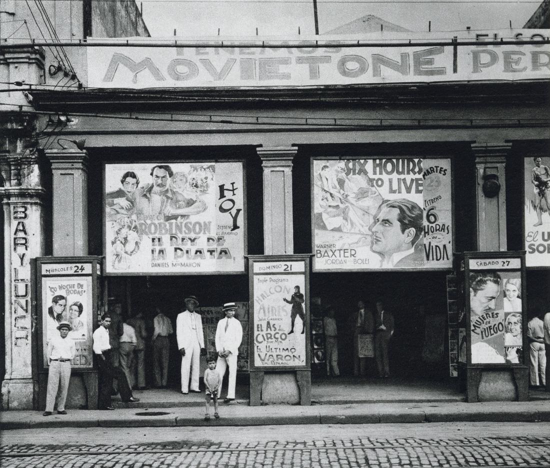 WALKER EVANS - Movie Theater, Havana, 1932: Artist: Walker Evans Title: Movie Theater, Havana, 1932 Medium: Sheet Fed Gravure, 1985, France Dimensions:7.25x6.15" Description: Heat Wax Mounted on 8.5x11" Conservation Board Artist Bio: Walker Eva