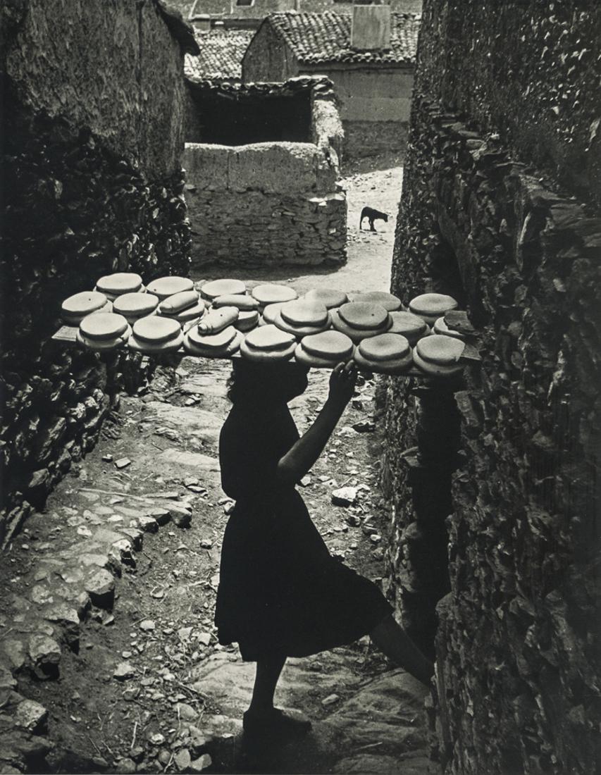 W. EUGENE SMITH - Woman with Bread, Spain, 1950: Artist: W. Eugene Smith Title: Woman with Bread, Spain, 1950 Medium: Photo Litho, 1995, USA Dimensions:6.8x8.75" Description: Heat Wax Mounted on 11x14" Conservation Board Artist Bio: W. Eugene Smith