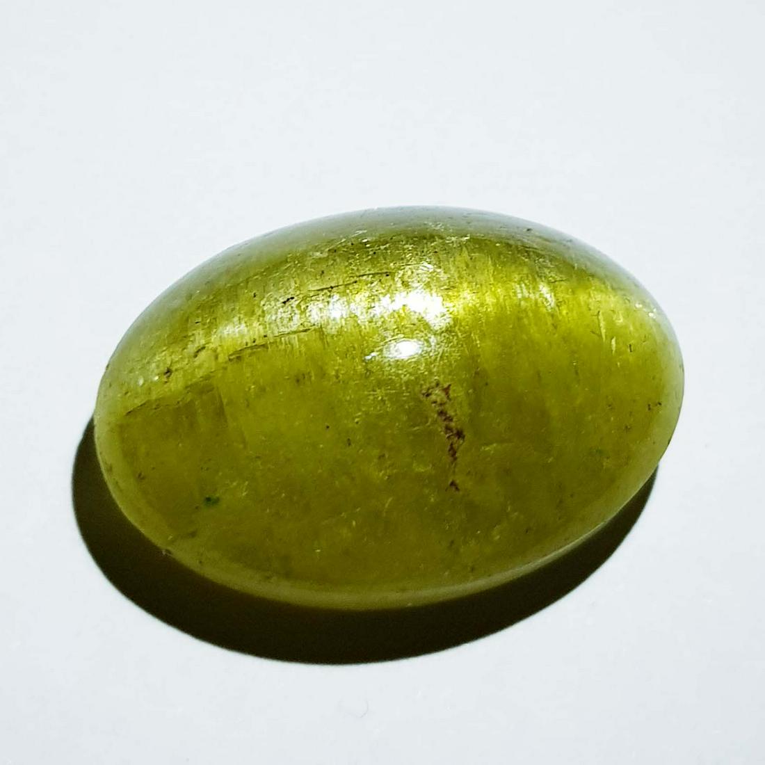 37.65 ct Natural Apatite cat's Eye: No Reserve! Title: 37.65 ct Natural Apatite cat's Eye Color/Clarity: Opaque Gemstones: Loosegemstone Carat Weights: 37.65 Size/Dimensions: 24.35 x 10.40 x 17.00 Additional Information: Oval - Jharkhan
