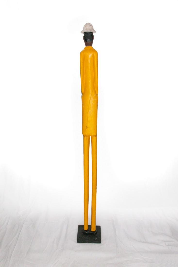Colonia Figure: Title: Colonia Figure Description: Hard Hat Figure Date/Period: 19th Century Materials/Origin: Africa, Ivory Coast Dimensions: H:41in Condition: Great Reserve: $100.00 Shipping: Domestic: Flat