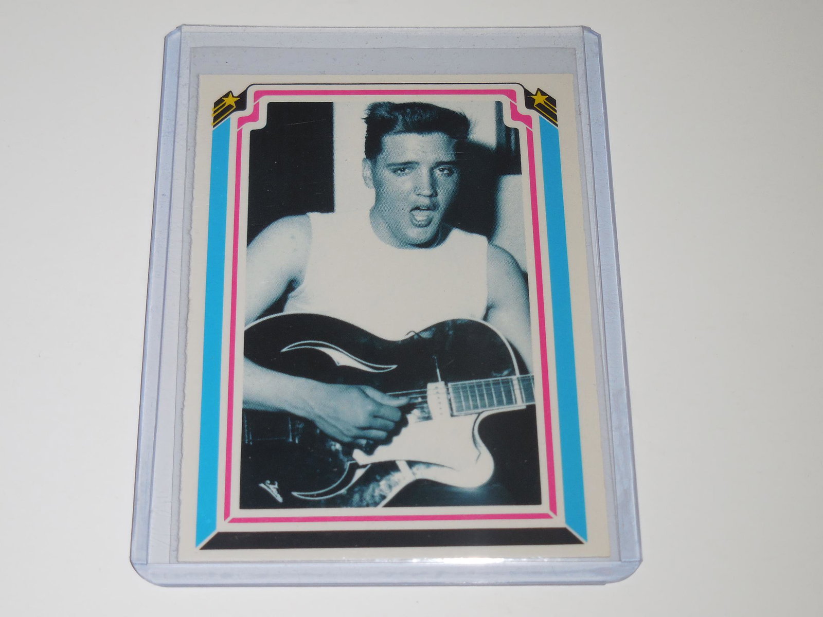 1978 DONRUSS ELVIS PRESLEY #11 W/ GUITAR: Title: 1978 DONRUSS ELVIS PRESLEY #11 W/ GUITAR Description: APPROXIMATELY NEAR MINT CONDITION COMES WITH SLEEVE AND TOP LOADER. Date/Period: VINTAGE Reserve: $3.00 Shipping: Domestic: Flat-rate of $5