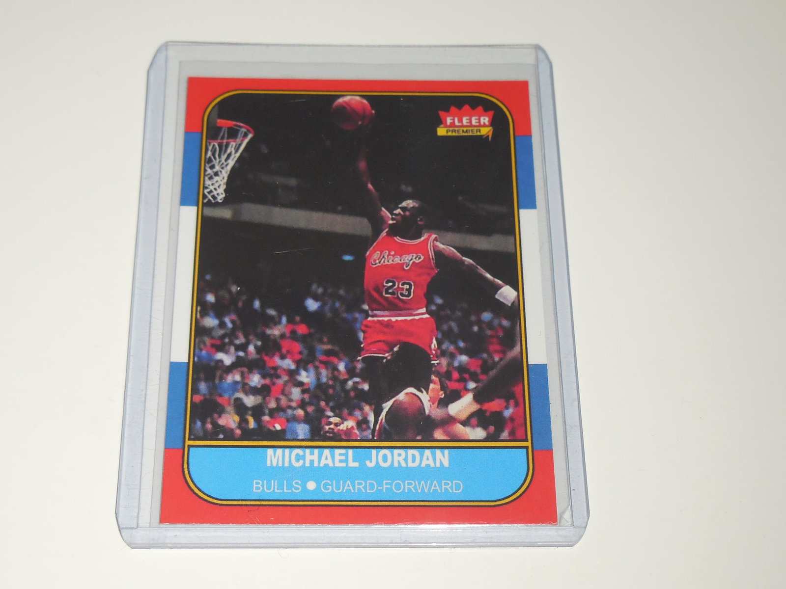 1986-87 FLEER MICHAEL JORDAN ROOKIE REPRINT CARD: Title: 1986-87 FLEER MICHAEL JORDAN ROOKIE REPRINT CARD Description: APPROXIMATELY NEAR MINT CONDITION COMES WITH SLEEVE AND TOP LOADER. Date/Period: MODERN Reserve: $3.00 Shipping: Domestic: Flat-rat
