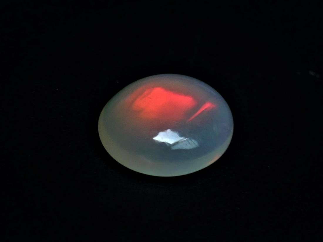 Opal Welo 1.67 ct: Title: Opal Welo 1.67 ct Gemstones: Opal Carat Weights: 1.67 ct Size/Dimensions: 10.20 x 8.20 x 3.20 mm Additional Information: Oval Mixed Cut Reserve: $10.00 Shipping: Domestic: Flat-rate of $10.00