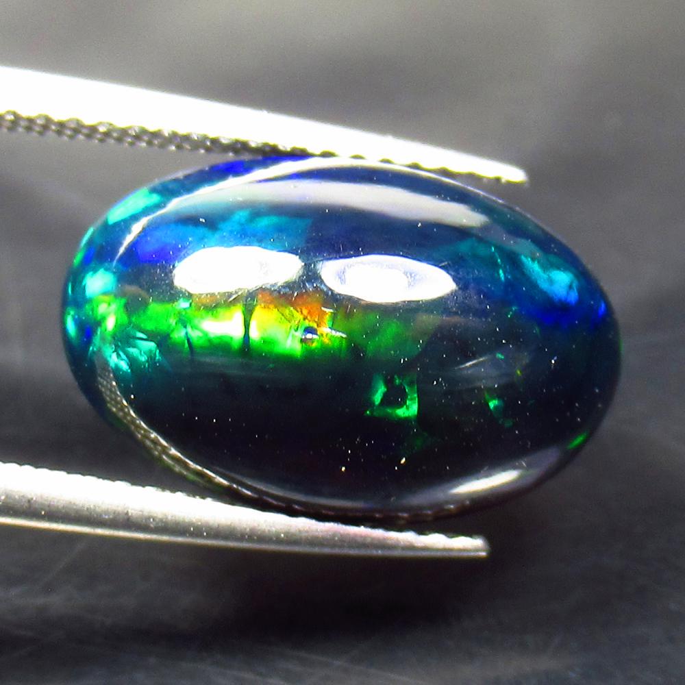 5.33 Ct Natural Ethiopian Black Fire Opal Oval Cab (1 of 3)