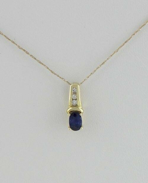 LADIES 10K YELLOW GOLD 1/2ct OVAL SAPPHIRE DIAMOND (1 of 1)