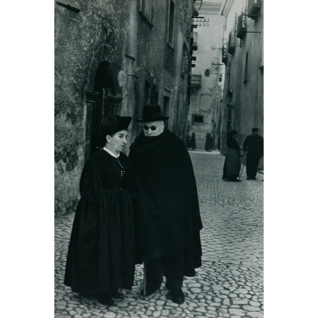 HENRI CARTIER-BRESSON - A Street in Scanno: Artist: HENRI CARTIER-BRESSON Print Title: A Street in Scanno Medium: Sheet-fed Gravure Printing Date: 1950's Printed in France Image Size approx.: 13.5 x 9 inches Henri Cartier-Bresson (1908-2004) wa