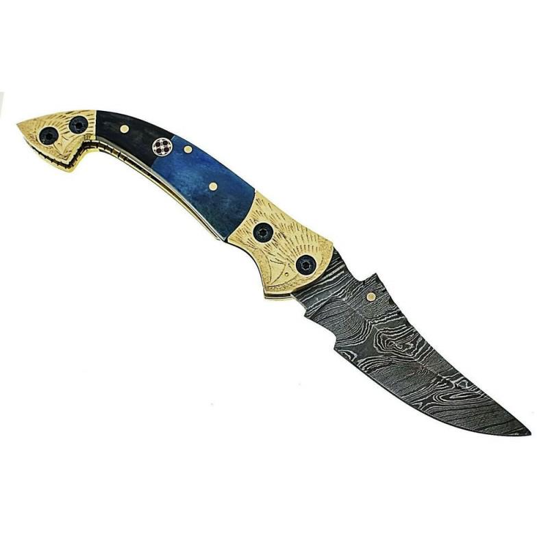 Folding damascus steel knife bone horn brass pocket: Knife "Madeira" made of damask steel. Handle – bone, buffalo horn, brass and scabbard - genuine leather. Damascus knives are very durable, look great and keep sharpness perfectly. Damascus steel has