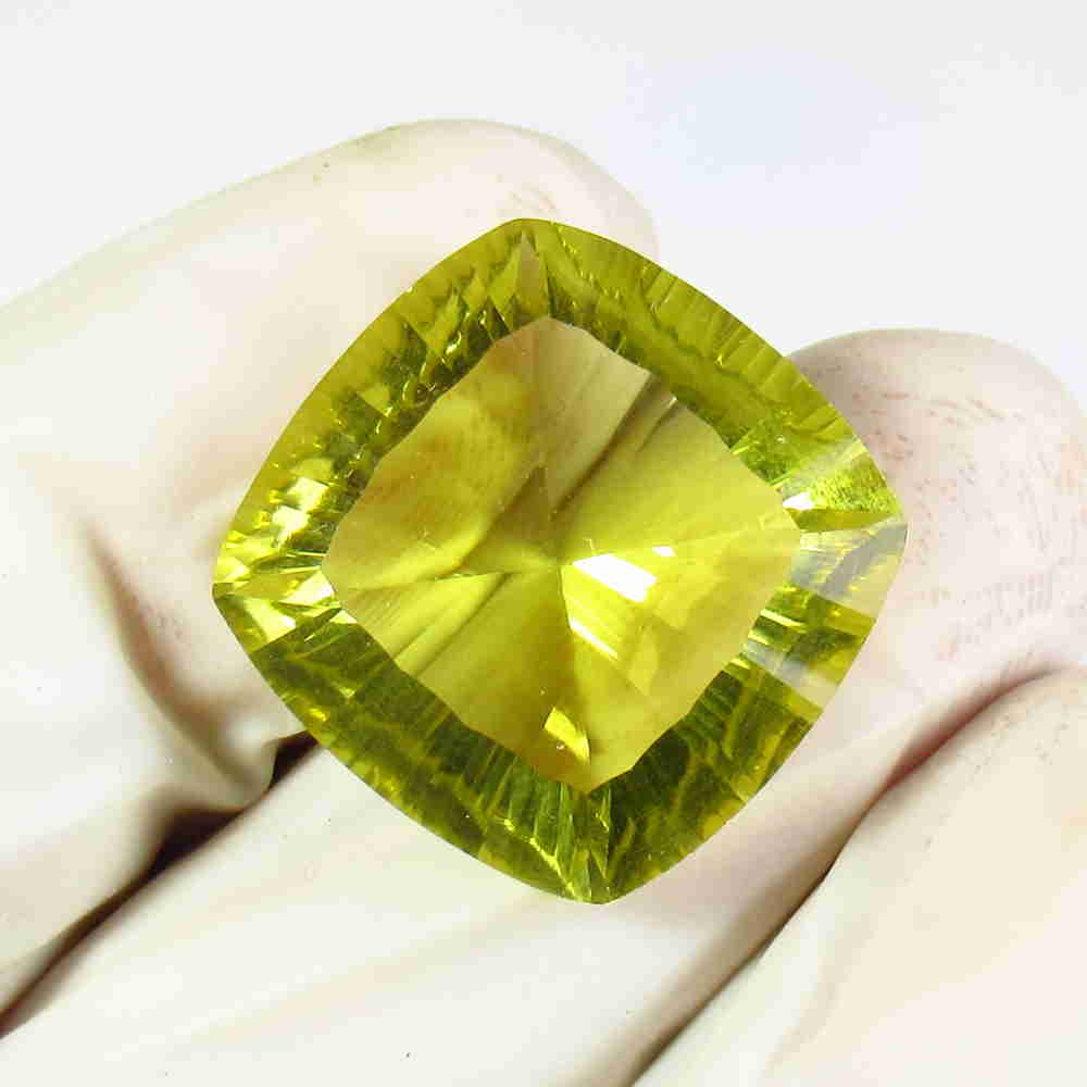 18.81 Ctw Natural Lemon Quartz Concave Cut: No Reserve! Title: 18.81 Ctw Natural Lemon Quartz Concave Cut Stone Clarity: VVS Gemstones: Lemon Quartz Carat Weights: 18.81 Size/Dimensions: 18.50 x 18.30 x 10.00 mm Additional Information: Good Lus