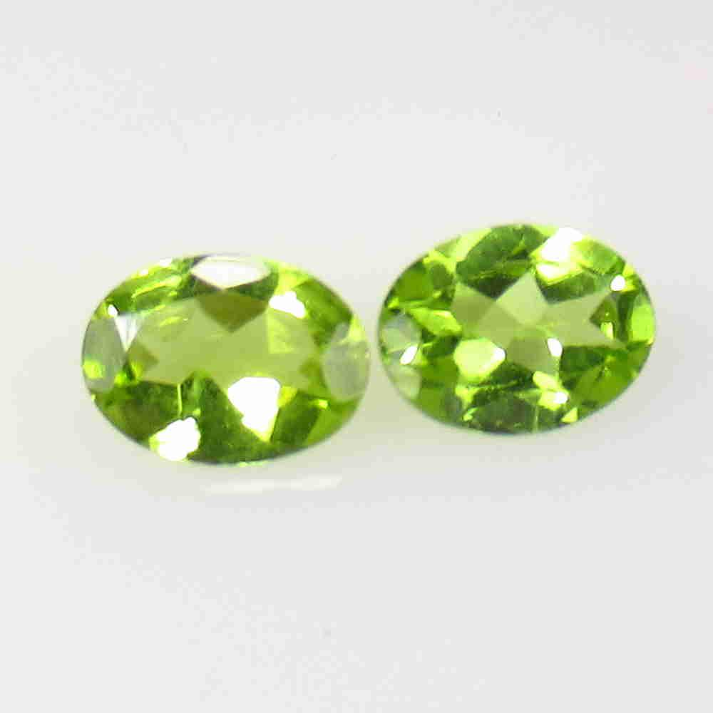 2.20 Ctw Natural Pakistan Peridot Oval Pair: No Reserve! Title: 2.20 Ctw Natural Pakistan Peridot Oval Pair Stone Clarity: VVS Gemstones: Peridot Carat Weights: 2.2 Size/Dimensions: 8.00 x 6.00 x 3.10 mm / 2 PC's Additional Information: Top Clas