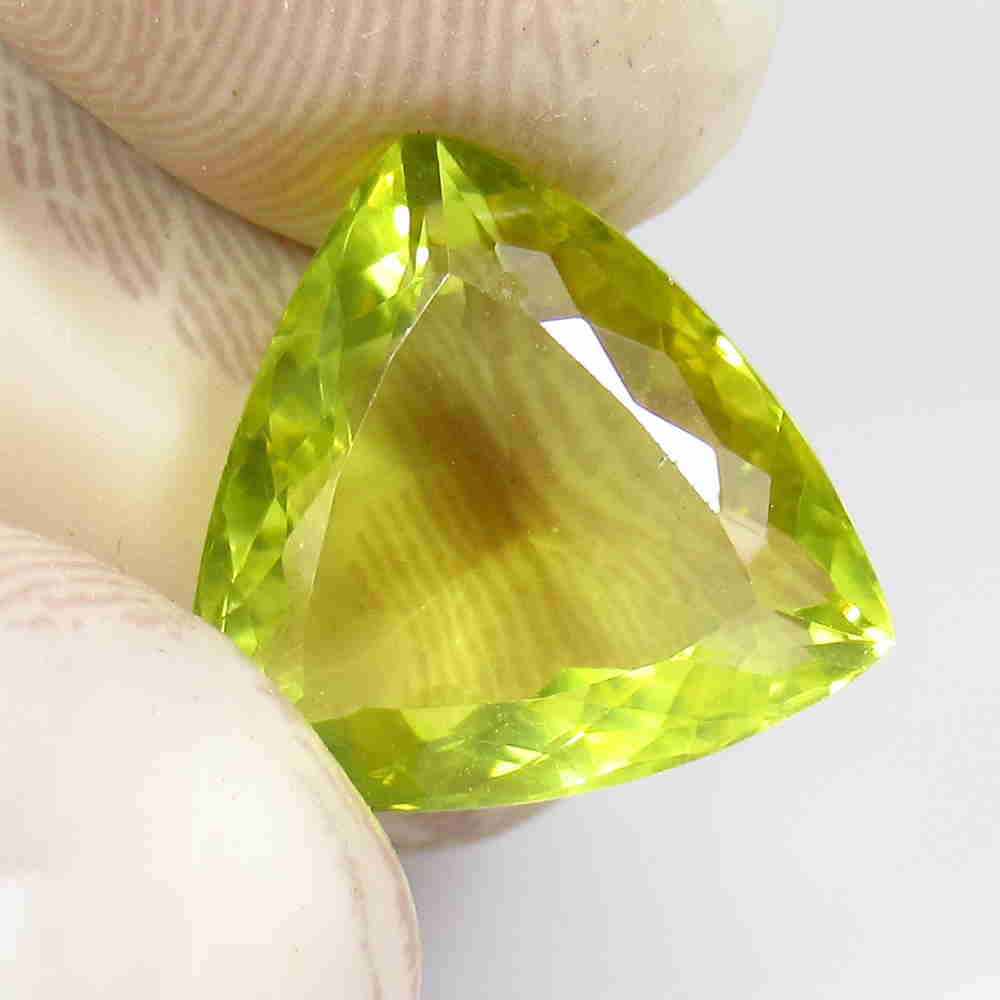 8.41 Ctw Natural Lemon Quartz Trillion Cut: No Reserve! Title: 8.41 Ctw Natural Lemon Quartz Trillion Cut Stone Clarity: VVS Gemstones: Lemon Quartz Carat Weights: 8.41 Size/Dimensions: 14.20 x 14.00 x 7.80 mm Additional Information: Good Luste