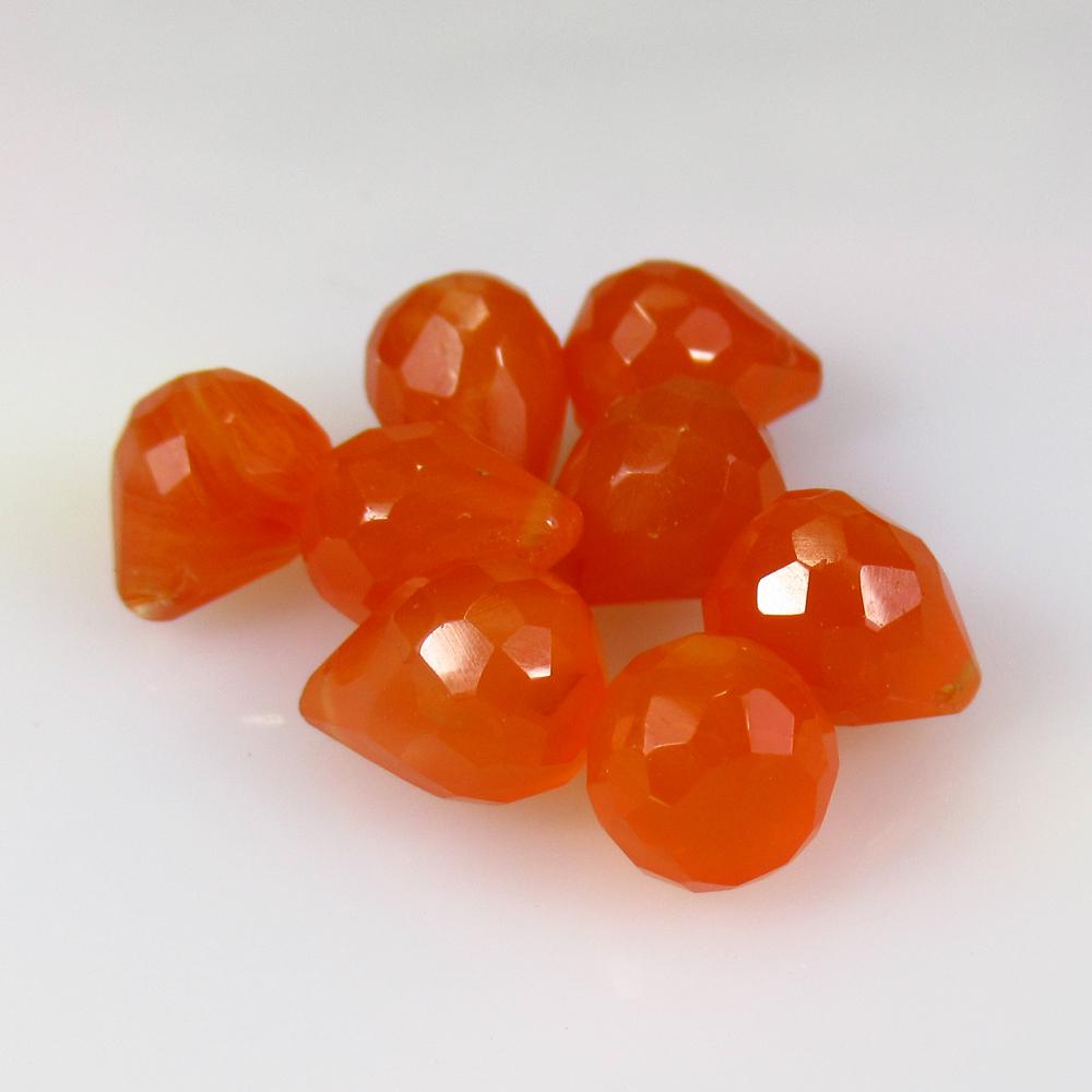 30.85 Ct Natural 8 Drilled Orange Carnelian Pear Drop: No Reserve! Title: 30.85 Ct Natural 8 Drilled Orange Carnelian Pear Drop Beads Stone Clarity: Semi-Transparent Gemstone: Natural Carnelian Beads Carat Weight: 30.85 Size/Dimensions: 9.5x7.9 - 11.0x8.2