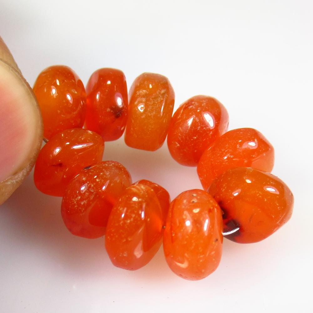 43.05 Ct Natural 10 Drilled Orange Carnelian Round: No Reserve! Title: 43.05 Ct Natural 10 Drilled Orange Carnelian Round Beads Stone Clarity: Semi-Transparent Gemstone: Natural Carnelian Beads Carat Weight: 43.05 Size/Dimensions: 9.30 - 10.60 mm / 10 