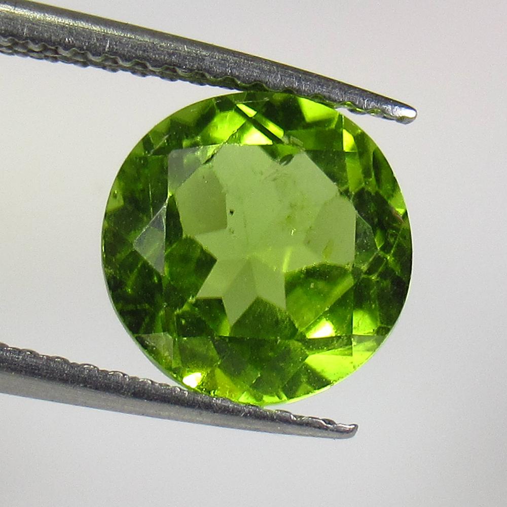 2.96 Ct Natural Pakistan Peridot Round Cut: No Reserve! Title: 2.96 Ct Natural Pakistan Peridot Round Cut Stone Clarity: VVS Gemstone: Natural Peridot Carat Weight: 2.96 Size/Dimensions: 9.00 x 9.00 x 5.30 mm Additional Information: Top Class F