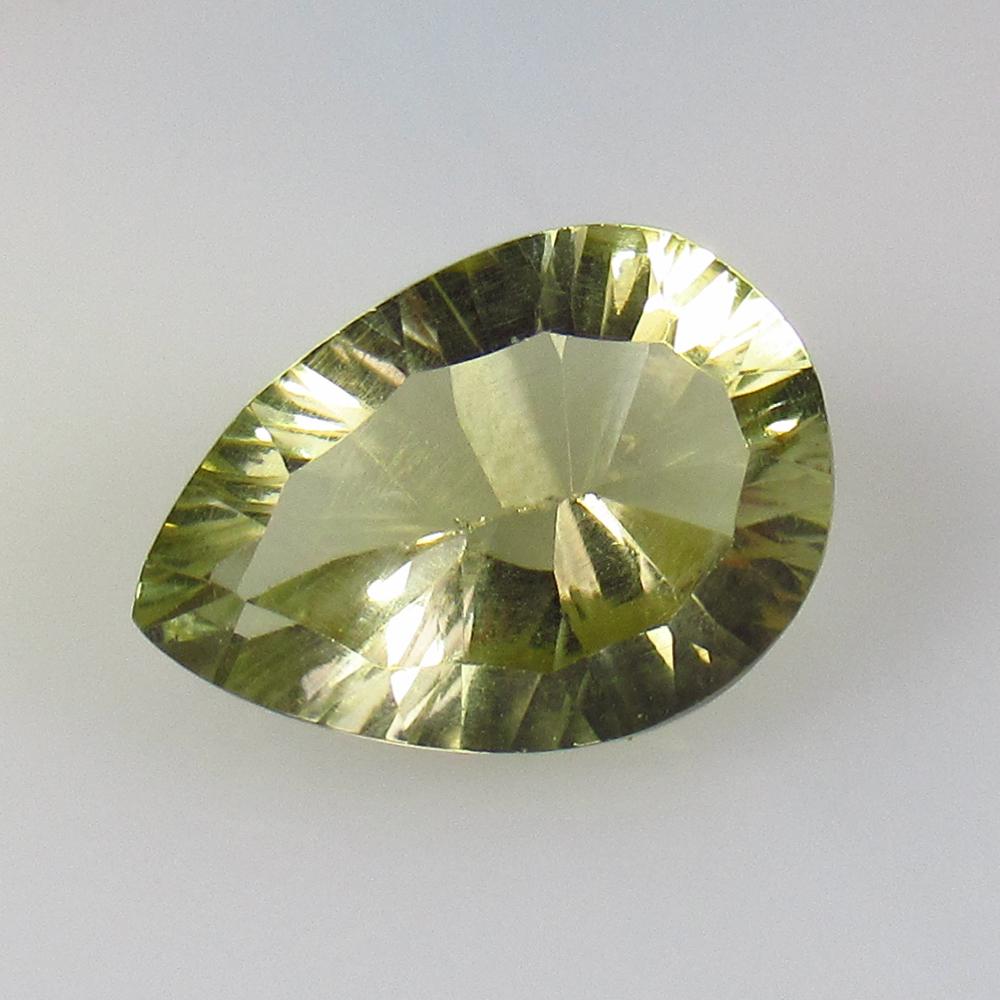 4.72 Ct Natural Lemon Quartz Concave Cut: No Reserve! Title: 4.72 Ct Natural Lemon Quartz Concave Cut Stone Clarity: VVS Gemstone: Natural Lemon Quartz Carat Weight: 4.72 Size/Dimensions: 13.60 x 9.60 x 6.60 mm Additional Information: Good Lu