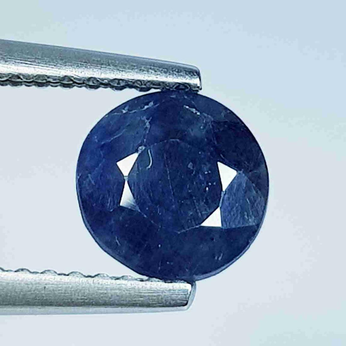1.60 Ct Natural Iolite Round Cut: No Reserve! Title: 1.60 Ct Natural Iolite Round Cut Stone Clarity: SI Carat Weight: 1.6 Size/Dimensions: 6.50 x 6.50 x 3.55 Additional Information: Round - Africa Shipping: Domestic: Flat-rate of $7.