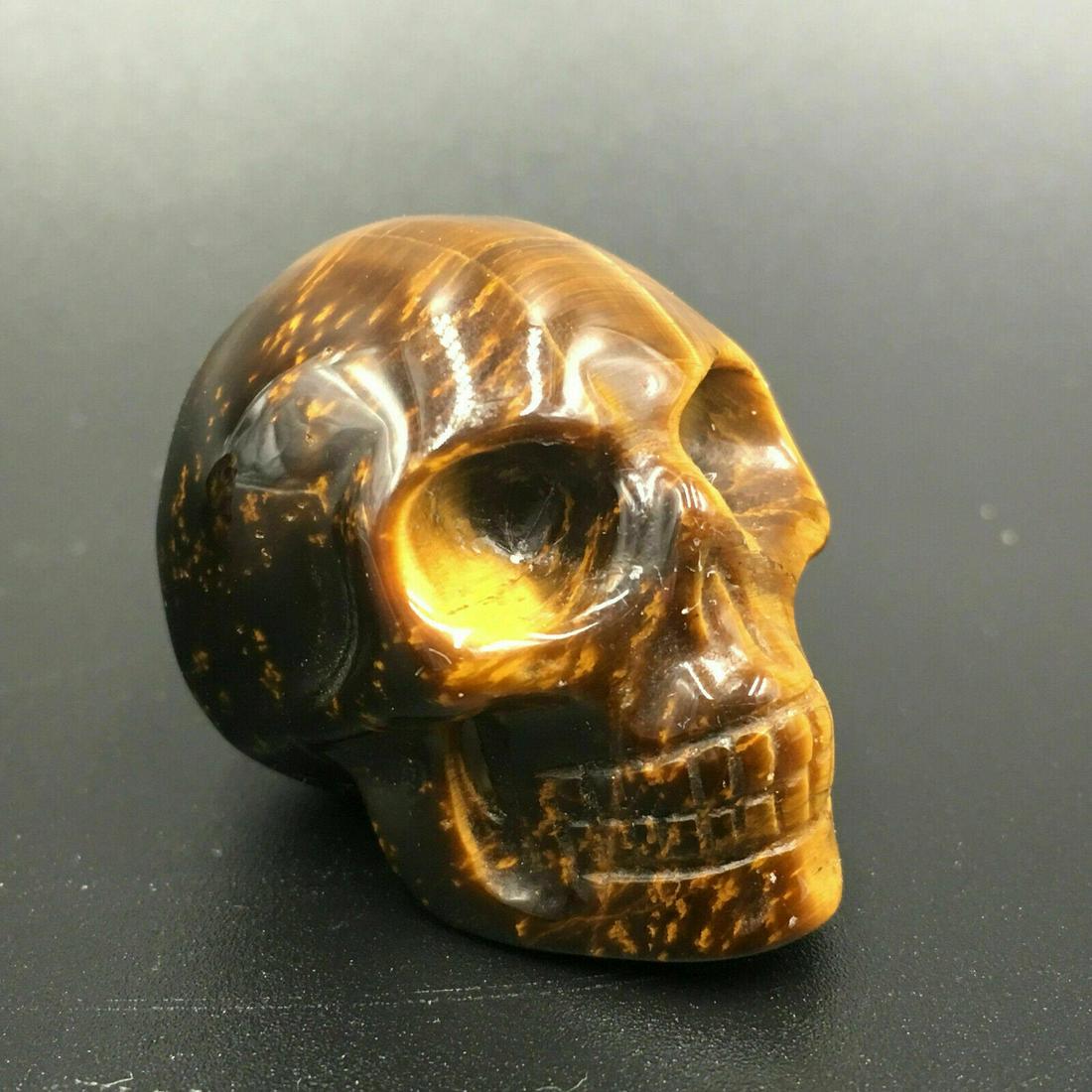 1.5" Natural Tiger‘s Eye quartz Crystal Carved Crystal: Specificatioin: Type: crystal skull Material?Tiger‘s Eye quartz Color:amber Net Weight:About 50g+ Size:About 1.5 inch(40*33*27MM) Reserve: $15.00 Shipping: Domestic: Flat-rate of $10.00 to anywhere 