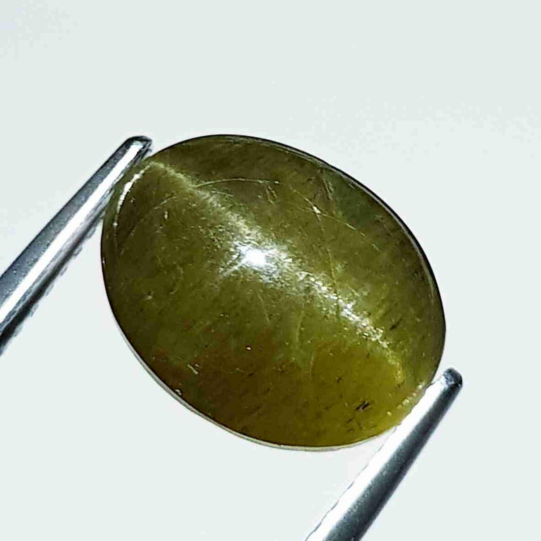 6.97 ct Natural Apatite cat's Eye: No Reserve! Title: 6.97 ct Natural Apatite cat's Eye Color/Clarity: Opaque Gemstones: Loosegemstone Carat Weights: 6.97 Size/Dimensions: 12.60 x 9.80 x 6.50 Additional Information: Oval - Jharkhand Sh