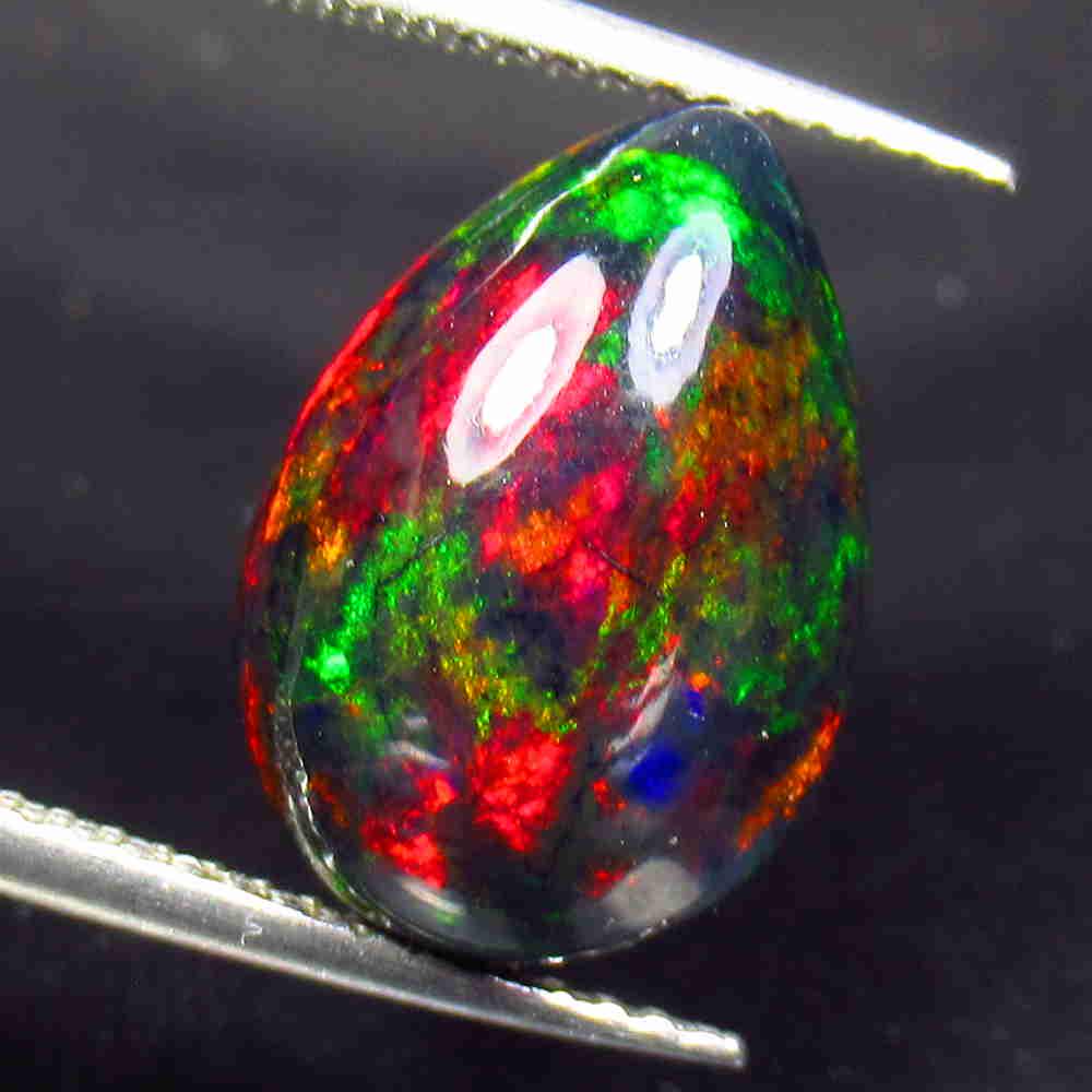 3.92 Ctw Natural Ethiopian Black Fire Opal Pear Cab: No Reserve! Title: 3.92 Ctw Natural Ethiopian Black Fire Opal Pear Cab Stone Clarity: Translucent Gemstone: Black Opal Carat Weight: 3.92 Size/Dimensions: 14.40 x 10.20 x 6.00 mm Additional Informatio