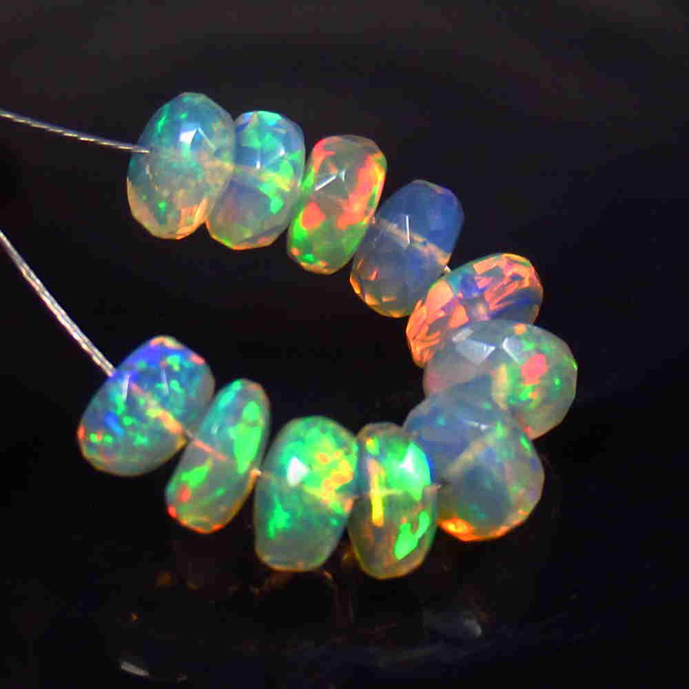5.95 Ctw Natural 11 Drilled Faceted Multi-Color Opal: No Reserve! Title: 5.95 Ctw Natural 11 Drilled Faceted Multi-Color Opal Beads Stone Clarity: Translucent Gemstone: Faceted Multi-Colour Opal Beads Carat Weight: 5.95 Size/Dimensions: 5.60 - 6.00 mm / 
