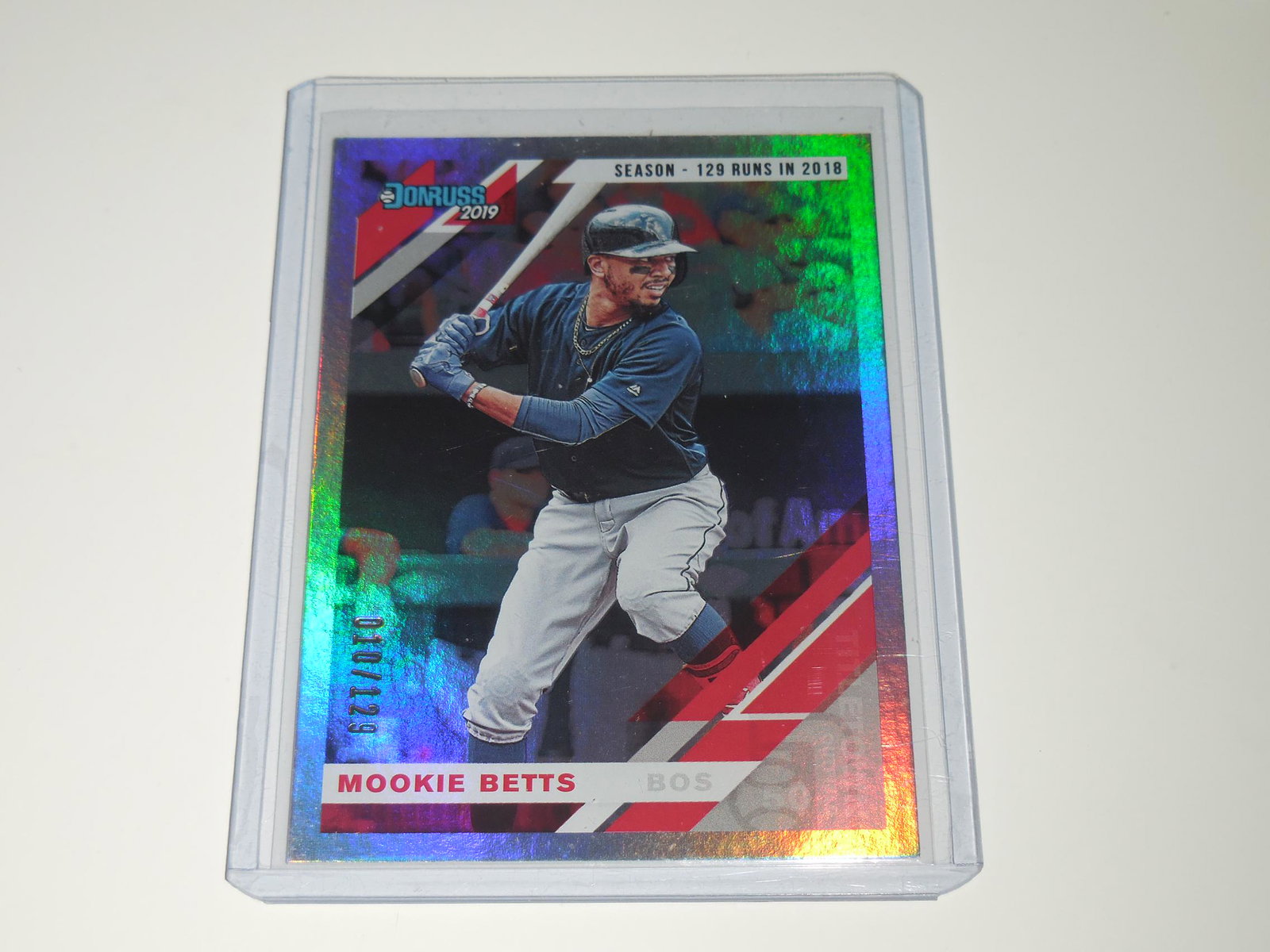2019 DONRUSS MOOKIE BETTS STAT LINE HOLO #'D 010/129: Title: 2019 DONRUSS MOOKIE BETTS STAT LINE HOLO #'D 010/129 Description: A VERY NICE LOOKING CARD. PLEASE VIEW PHOTOS TO DETERMINE THE ITEMS CONDITION BUT THIS IS APPROXIMATELY NEAR MINT OR BETTER CON