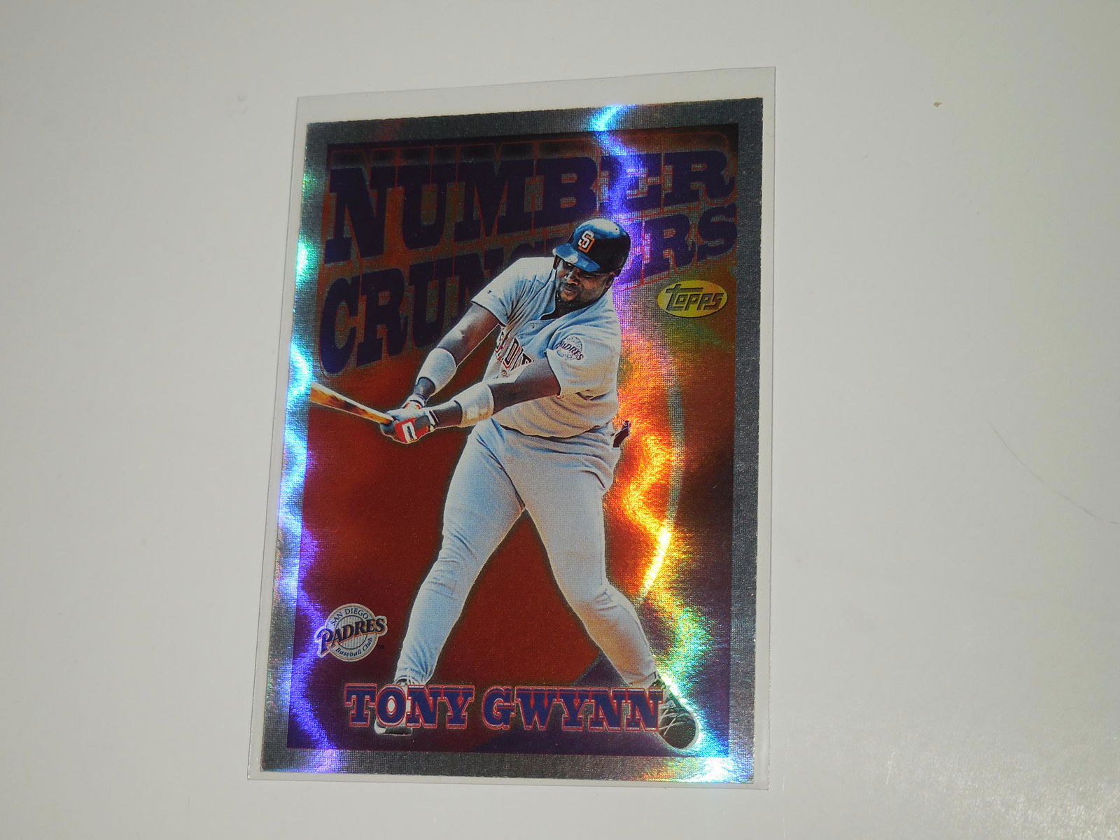 1997 TOPPS TONY GWYNN NUMBER CRUNCHERS HOLO: Title: 1997 TOPPS TONY GWYNN NUMBER CRUNCHERS HOLO Description: A VERY NICE LOOKING CARD. PLEASE VIEW PHOTOS TO DETERMINE THE ITEMS CONDITION BUT THIS IS APPROXIMATELY NEAR MINT OR BETTER CONDITION. I