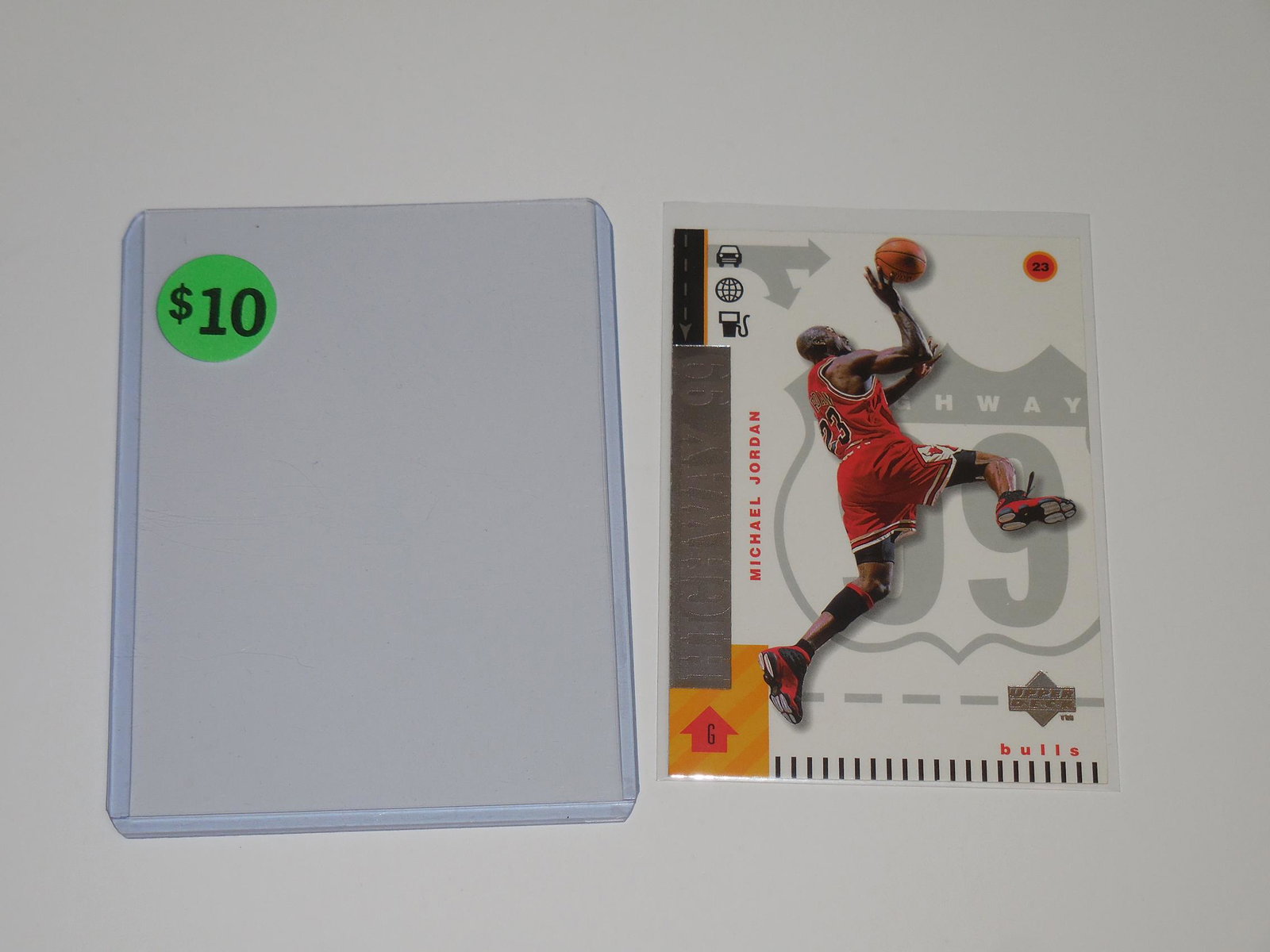 1999-00 UPPER DECK MICHAEL JORDAN HIGHWAY 99 CARD: Title: 1999-00 UPPER DECK MICHAEL JORDAN HIGHWAY 99 CARD Description: A VERY NICE LOOKING CARD. PLEASE VIEW PHOTOS TO DETERMINE THE ITEMS CONDITION BUT THIS IS APPROXIMATELY NEAR MINT OR BETTER CONDIT