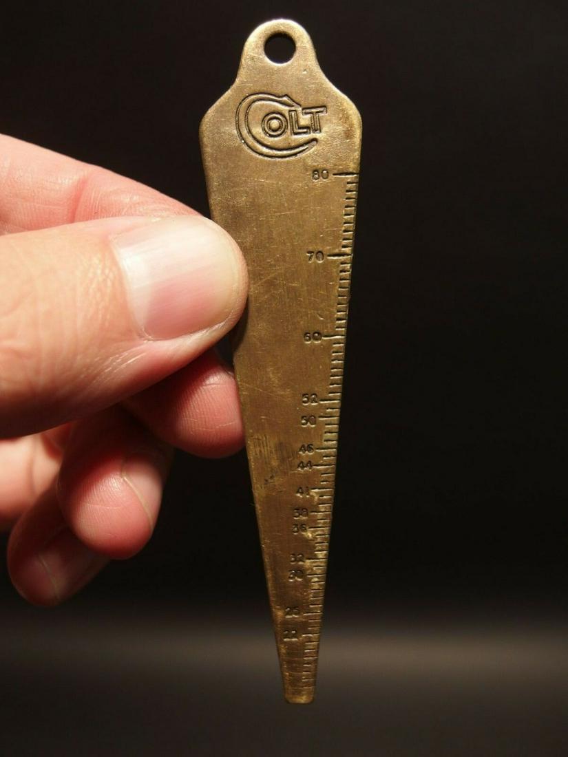 Colt Firearms Gunsmith Bore Gage Key chain: 3 1/2" Long Nice Colt advertising bore gauge. Great for a key ring. For use on the go. Solid brass. Reserve: $15.00 Shipping: Domestic: Flat-rate of $6.00 to anywhere within the contiguous U.S. Intern