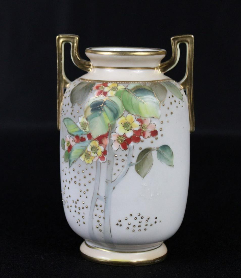 Nippon Apple Blossoms Vase: Title: Nippon Apple Blossoms Vase Description: Nippon Vase with Yellow and Red Flowers and Gold Gilding Date/Period:Early 20th Century Material: Porcelain Size: 6" T x 4 "W x 3" Opening Reserve: $65.0