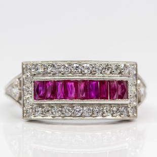 Handmade Platinum Ruby and Diamond Band: Lovely ring entirely crafted in platinum that features a central row consisting of 9 natural French cut rubies 0.75ctw. its rectangular shape design is also embellished with 34 old mine cut diamonds