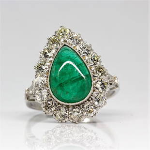 Platinum Handmade Emerald & Diamond Halo Ring: Composition: Platinum Stones: 1 Natural pear shape emerald 3.10ctw. 18 Old mine cut diamonds H-VS2 1.38ctw Ring size: 7 Ring face: 20mm by 15mm. Rise above finger: 7mm. Total weight: 6.8 grams