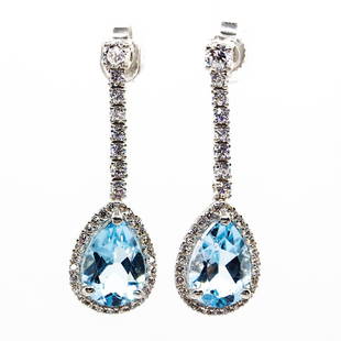 Modern 18K Gold Diamonds and Aquamarines Earrings: Composition: 18k Gold 2 natural pear shape aquamarines 5ctw. 34 full cut diamonds of H-VS2 0.65ctw. Total weight: 5.0 grams - 3.2dwt Reserve: $1,936.00 Shipping:Domestic: Flat-rate of $10.00 to