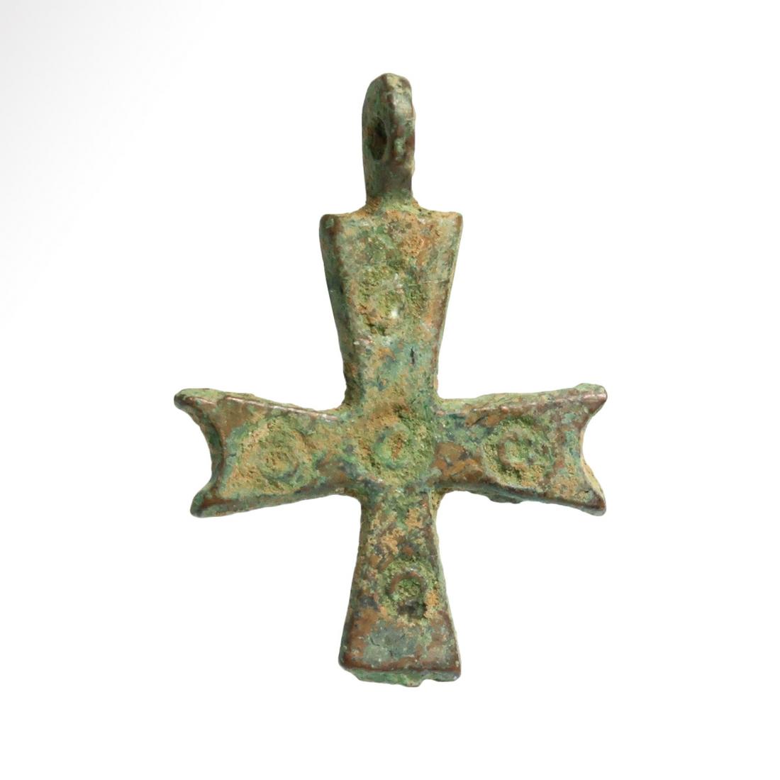 Byzantine Bronze Cross, c. 6th-8th Century A.D.: Title: Byzantine Bronze Cross, c. 6th-8th Century A.D. Date/Origin: Byzantine, c. 6th-8th Century A.D. Description: Byzantine bronze cross with engraved circles. Looped for suspension. Materials: Bron
