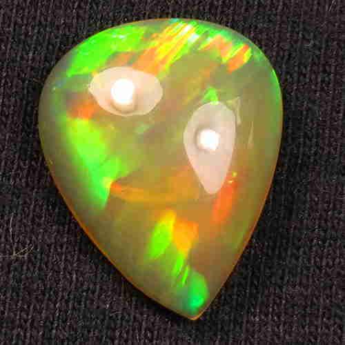 WHITE OPAL 3.00ct gorgeous 100% Natural Multi Color: Title: WHITE OPAL 3.00ct gorgeous 100% Natural Multi Color Ethiopian Welo Opal - PEAR Carat Weight: 3.00 Size/Dimensions: 14.10x11.40x4.70 MM Additional Information: NATURAL UNHEATED Reserve: $25.00 S