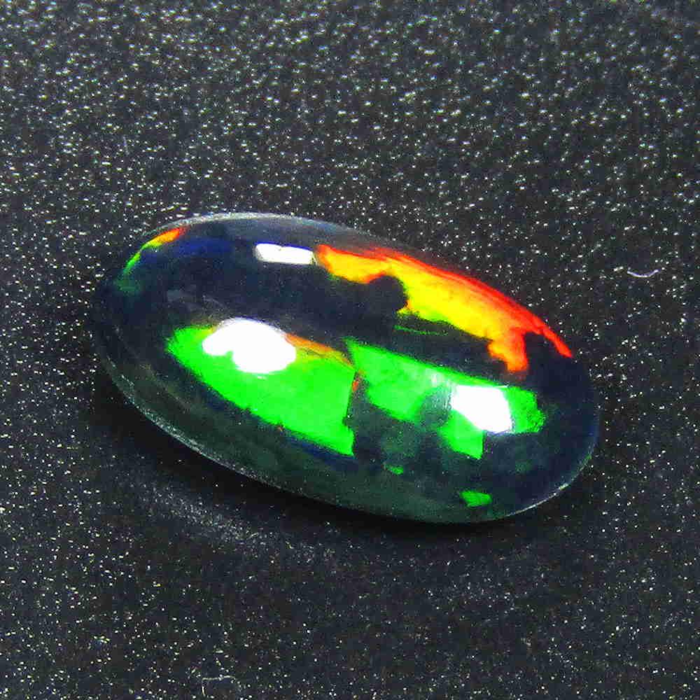 1.10Cts Natural Multi color Black Opal Oval Cabochon: Title: 1.10Cts Natural Multi color Black Opal Oval Cabochon Good Luster loose gemstone Carat Weight: 1.10 Size/Dimensions: 10.80x6.10x3.30 MM Additional Information: NATURAL HEATED Reserve: $15.00 Shi