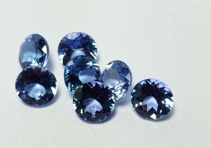 4.75 CTS 7 PCS ROUND NATURAL TANZANITE GOOD LUSTER: Title: 4.75 CTS 7 PCS ROUND NATURAL TANZANITE GOOD LUSTER LOOSE GEMSTONES Carat Weights: 4.75 Size/Dimensions: 5.3-5.5 MM Additional Information: TANZANIA ORIGIN Reserve: $75.00 Shipping: Domestic: Fl