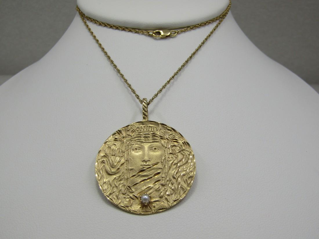 Vintage 14kt Goddess Pearl Necklace, Tilghman Island,: Vintage 14kt Goddess Pearl Necklace, Tilghman Island, 21.5", Appx. 11.08 gr. 1990's. This has a 14kt pendant that is 1.5" long and 1.25" wide with a wide wide. An image of a goddess on the top and a s