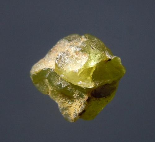 2.2 CT VIVID GREEN PERIDOT - UNTREATED: Title: 2.2 CT VIVID GREEN PERIDOT - UNTREATED Origin: Megado, Oromia Reg. Ethiopia Size: 0.76x0.7x0.5 cm / 0.44 gram Description: vivid green peridot crystal Reserve: $2.00 Shipping: Domestic: Flat-ra