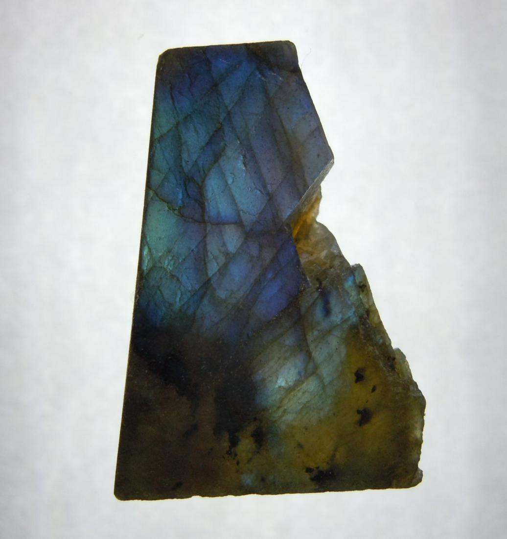 7.68 GRAM IRIDESCENT LABRADORITE: Title: 7.68 GRAM IRIDESCENT LABRADORITE Origin: Ampanihi, Atsimo Andrefana, Madagascar Size: 2.8x1.5x0.6 cm / 7.68 gram Description: iridescent, multicolor and translucent labradorite Reserve: $2.00 S