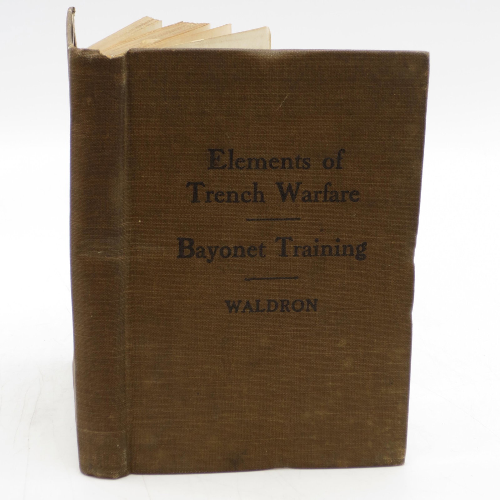Elements of Trench Warfare, Bayonet Training: SKU #: 060677 Title: Elements of Trench Warfare, Bayonet Training Description: Brown cloth covers. Illustrated. 225pp. plus 6 pages of ads. Covers and spine have some small light stains, and are bumpe