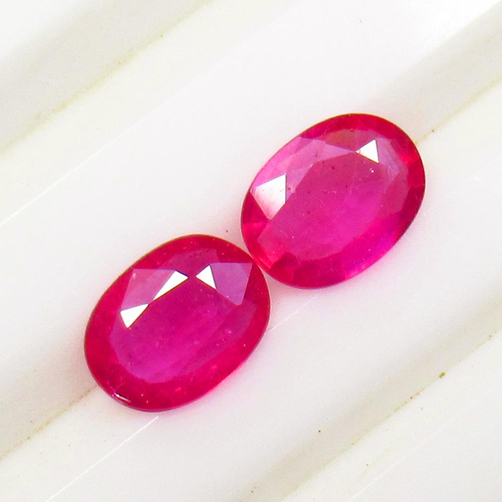 2.09 Ct Natural Pinkish Ruby Oval Pair (1 of 2)